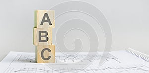 The word ABC structured query language, lined with wooden blocks photo