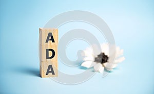 Word ADA Americans with Disabilities Act is made of wooden building blocks.