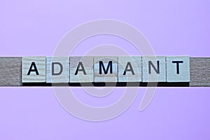 word adamant made from wooden gray letters