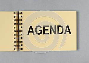 Word agenda. Concept of important order and business on meeting