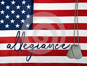 Word allegiance and dog tags photo