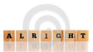 The word - Alright - on wooden blocks photo