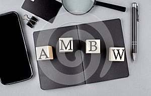 wooden cubes with the word ADC stand on a financial background, business concept photo