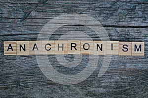 Word anachronism made from  wooden letters
