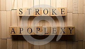 The word Apoplexy stroke was created from wooden cubes. Health and life. photo