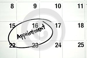 Word Appointment Circled on Calendar photo