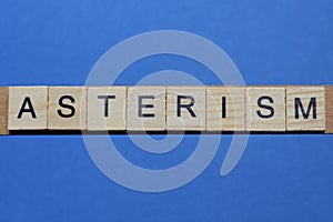 word asterism made from wooden gray letters photo