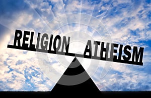 Word atheism is more powerful than the word religion on the scales