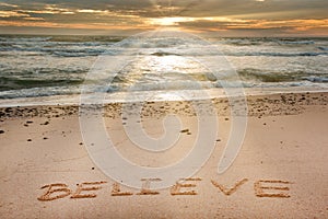 Word Believe at Beach in The Morning Sunshine