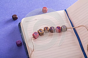 Word beyond on wooden cubes photo