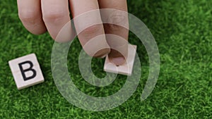 Word BIO composed on an artificial grass.