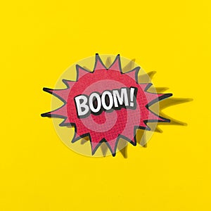 Word boom retro comic speech bubble yellow background