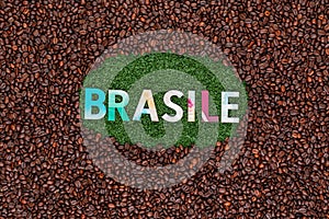 Word Brasile on grass with coffee beans around photo