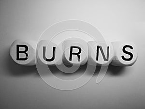 Word burns spelled on dice