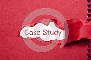 The word case study appearing behind torn paper.