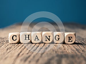 The word Change on small dices