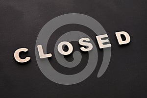 Word Closed on black background