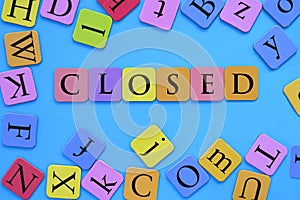 The word closed in colorful letters