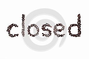 The word `closed` is made up of roasted coffee beans