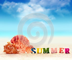 Word of color letters on summer beach and seashell