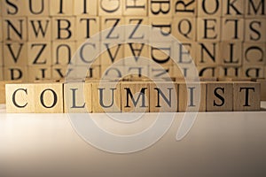 The word columnist was created from wooden cubes. Countries and politics