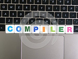 Word Compiler on keyboard background