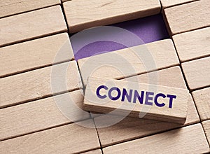 The word connect on wooden blocks. Making a connection and bridging the gap