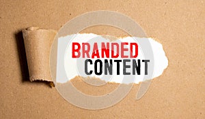 The word Content appearing behind torn brown paper