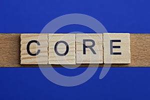 Word core made from wooden gray letters