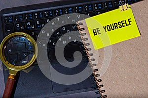 Word cost through magnifying glass on red and white background with copy space for text