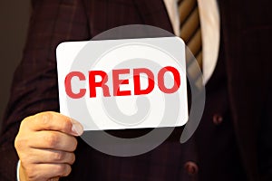 word credo printed on white paper macro photo