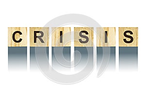 Word Crisis, composed of letters on wooden construction cubes. White background, isolated Concept business, finance.