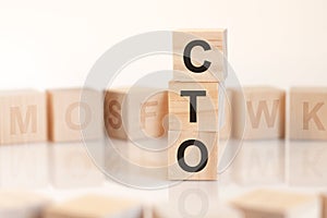 Word cto from wooden blocks with letters, concept