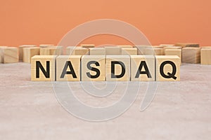 word blocks lined up with the letters NASDAQ written on it. copy space available photo