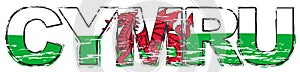 Word CYMRU Welsh translation of Wales with national flag under it, distressed grunge look