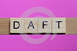 word daft from small gray wooden letters photo