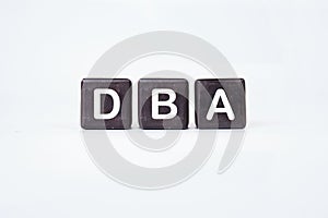Word DBA (Database administrator) on cubes on a white background
