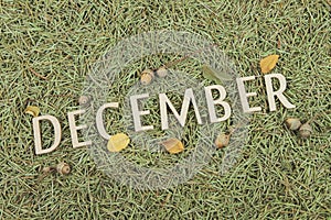 Word December corrugated saddle on Christmas background