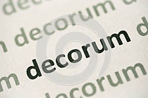 Word decorum printed on paper macro