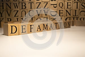 The word defamation end was created from wooden cubes. Countries and politics