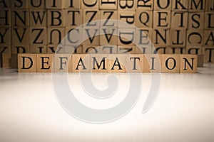 The word defamation end was created from wooden cubes. Countries and politics