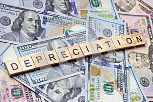 The word depreciation on dollar usa background.