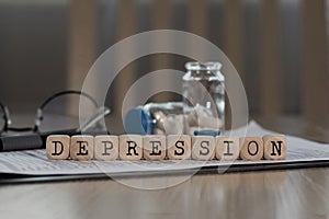 Word DEPRESSION composed of wooden dices photo