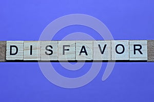 Word disfavor made from wooden gray letters