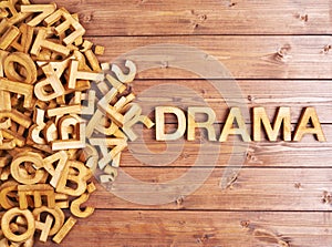 Word drama made with wooden letters