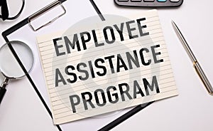 word EAP Employee Assistance Program text on white paper on light background