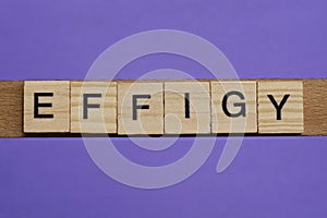 Word effigy made from wooden gray letters