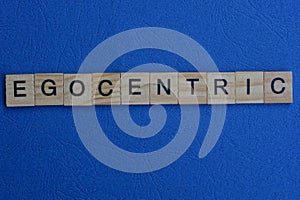 Word egocentric of wooden letters photo