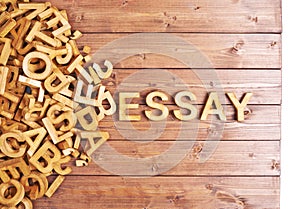 Word essay made with wooden letters