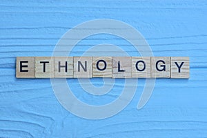 word ethnology made from wooden gray letters photo